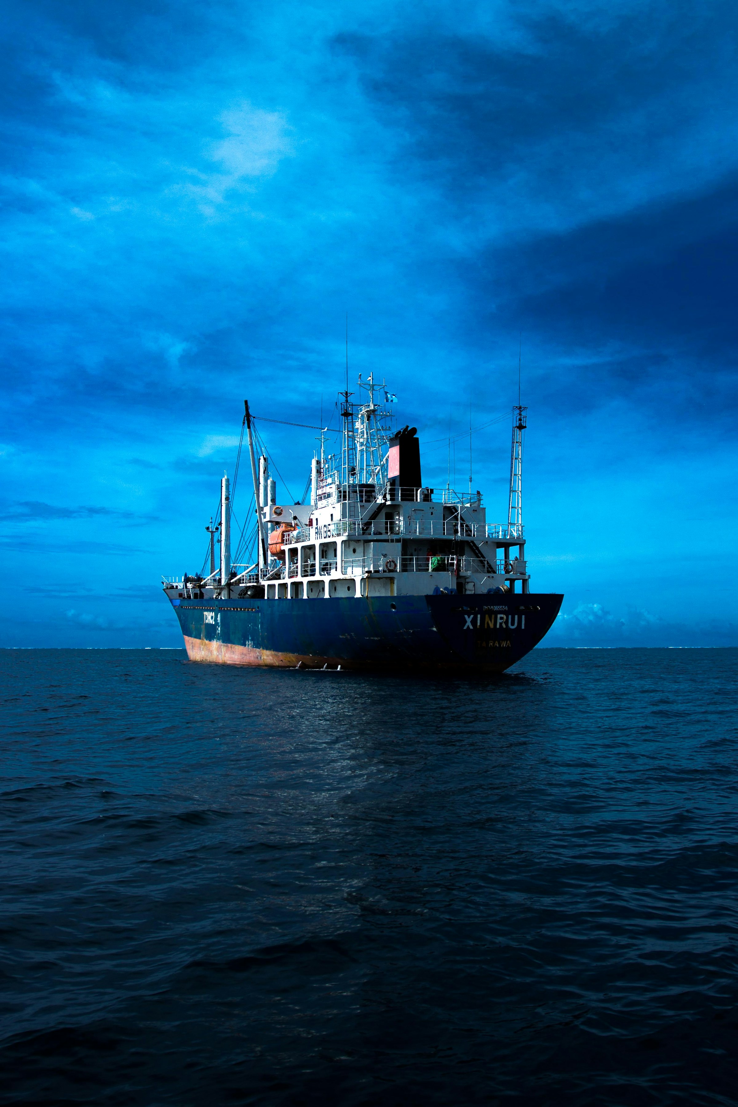 Cargo vessel moving through open water